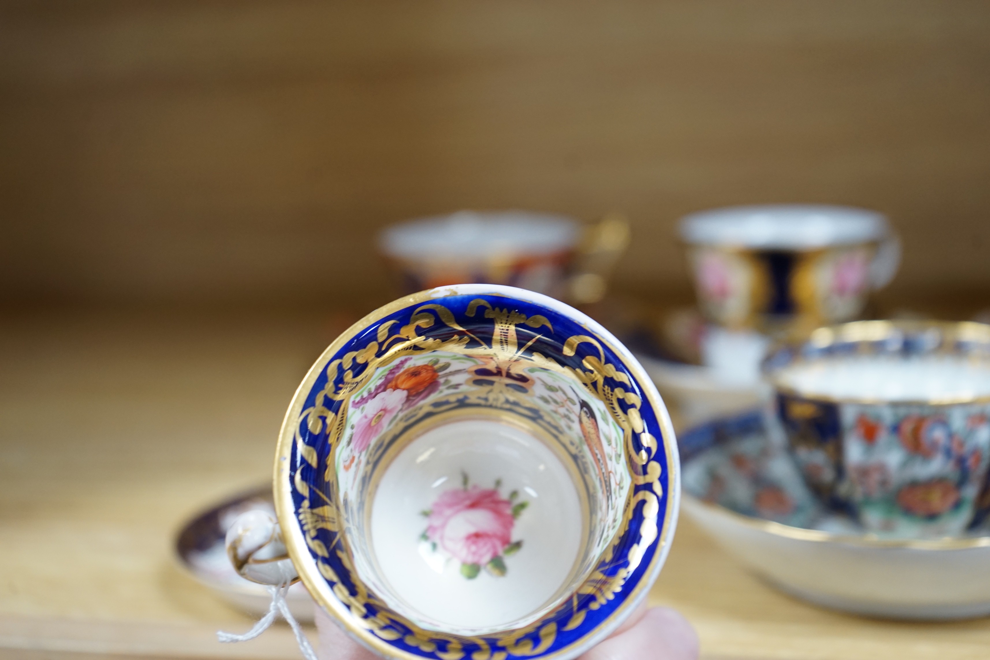A selection of various English porcelain tea cups and saucers, to include Barr Flight Barr